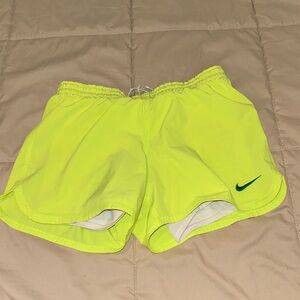 Neon yellow Nike shorts